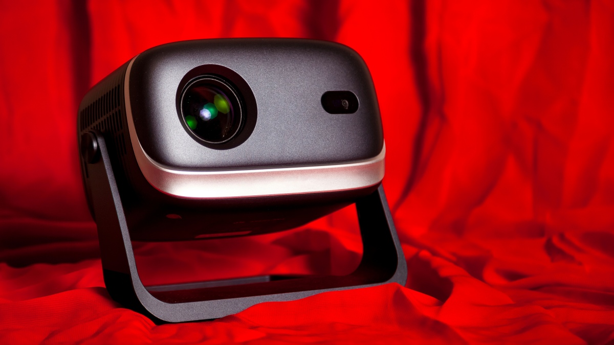 shot of a projector placed on a red cloth for the illustration of best projectors
