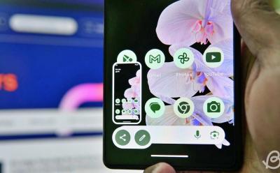 hand holding Google Pixel phone showing a preview of a screenshot taken