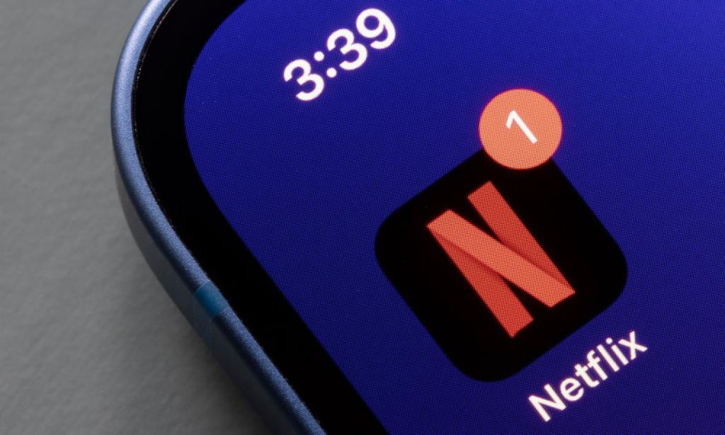 close up shot of the Netflix app icon on the iPhone home screen