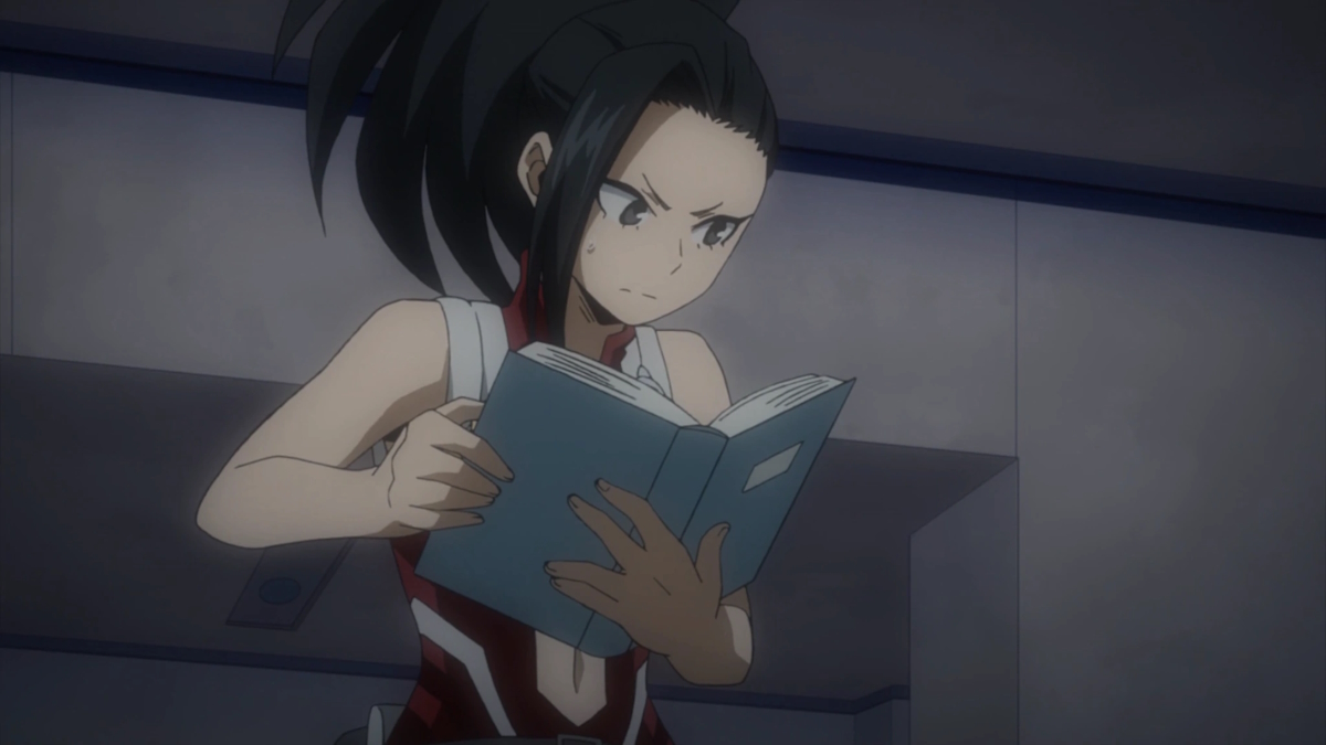 Momo with a book