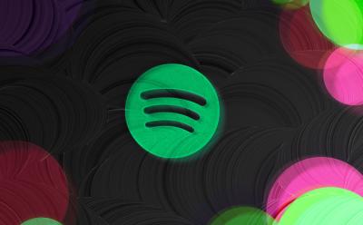 This image depicts the Spotify logo placed in a black background with colored corners