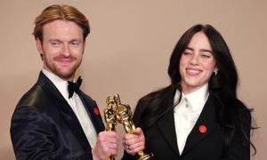 What Are the Red Pins at the Oscars 2024? Explained