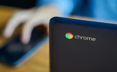 a chromebook with the chrome icon
