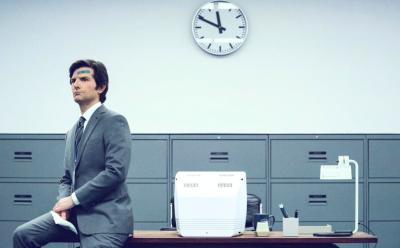 MArk sitting on his work station