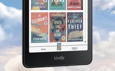 Amazon Kindle Colorsoft in front of a sky and cloud backdrop