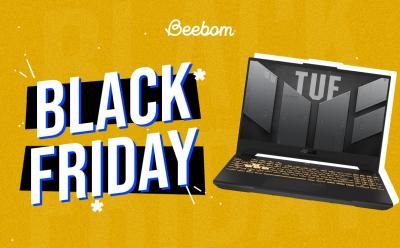 An open lid Asus TUF Gaming Laptop placed in front of a yellow background with Black Fridal text on the left