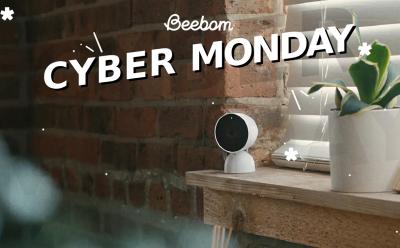 Google Nest Indoor camera placed on a wooden desk next to a window