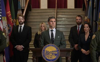 Jamie at a press conference announcing the death of John Dutton in Yellowstone