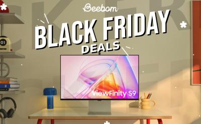 Samsung Viewfinity S9 placed on a wooden desk in front of a cream colored background with Black Friday Deals text written on top