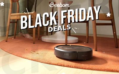 iRobot Roomba j9+ placed down on an orange rug with a Black Friday Deals text overlaid at the top