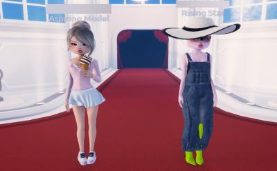 Duo poses in Dress to Impress