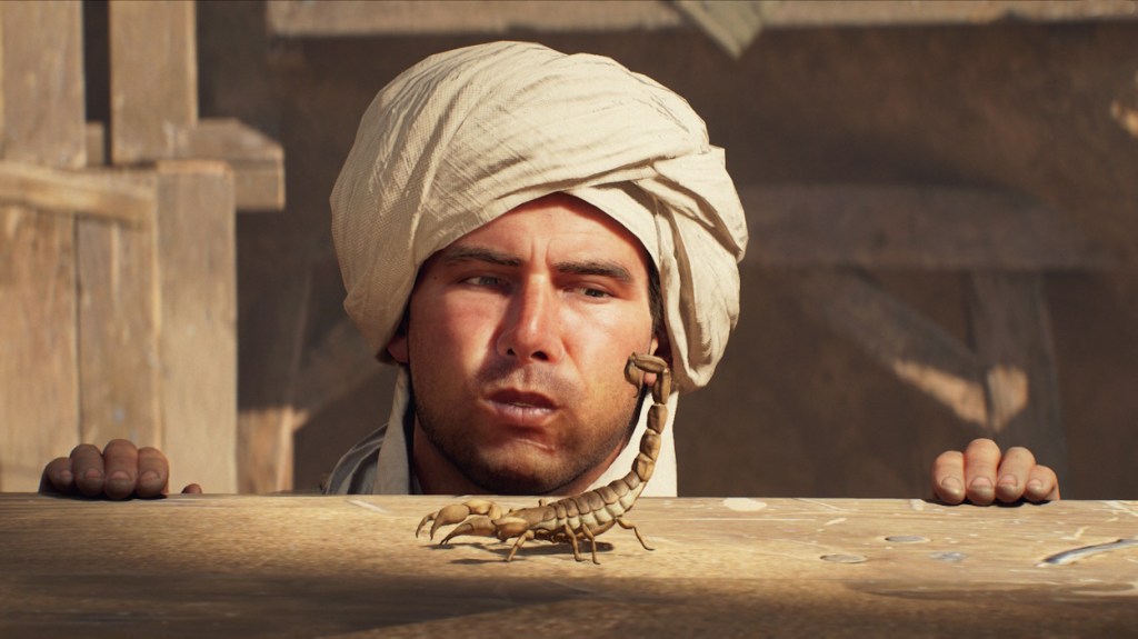 Indiana Jones making a scorpion go away