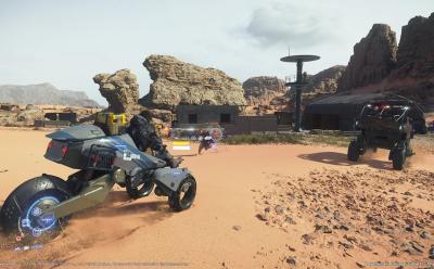 Death Stranding 2 gameplay featuring Sam Bridges riding a motorcycle