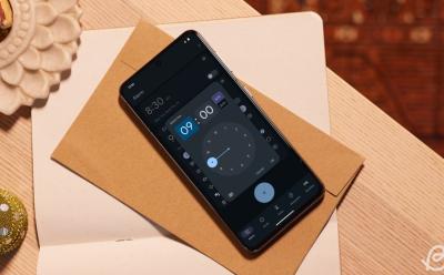 shot of an Android phone showing the process of setting an alarm on the Google Clock app