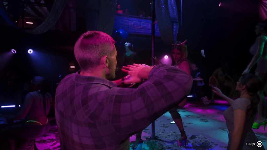 Jason throwing money at a stripper with Lucia dancing beside him in one of GTA 6's strip club.