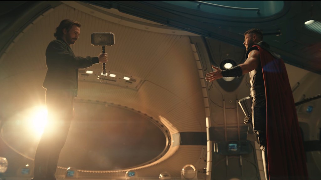 Captain America wielding the Mjolnir