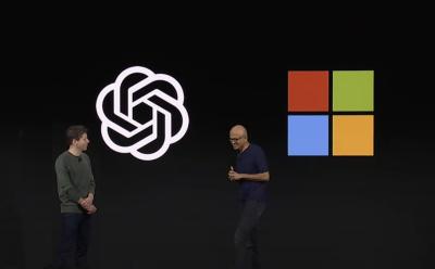 openai ceo sam altman shaking hands with microsoft ceo satya nadella