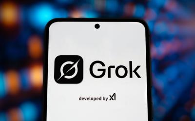 Grok-logo-on-an-Android-phone-with-an-AI-type-background