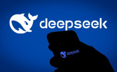 deepseek logo with a phone in the foreground