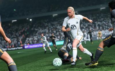 EA FC 26 Gameplay with a player committing a slide tackle