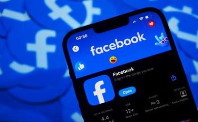 The Facebook app appears on an iPhone in the App Store