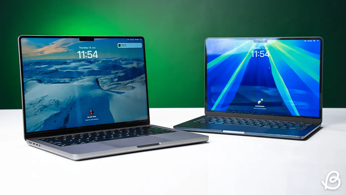 shot of Macbooks placed on a desk