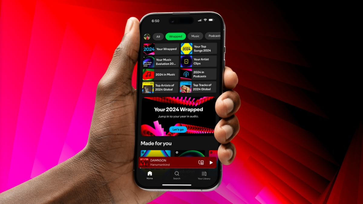 Spotify-Wrapped-2024-Shown-in-smartphone-held-in-hands