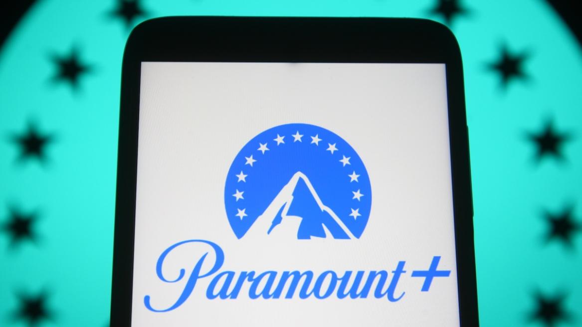 Paramount-Logo-on-a-Phone-behind-a-star-spangled-background