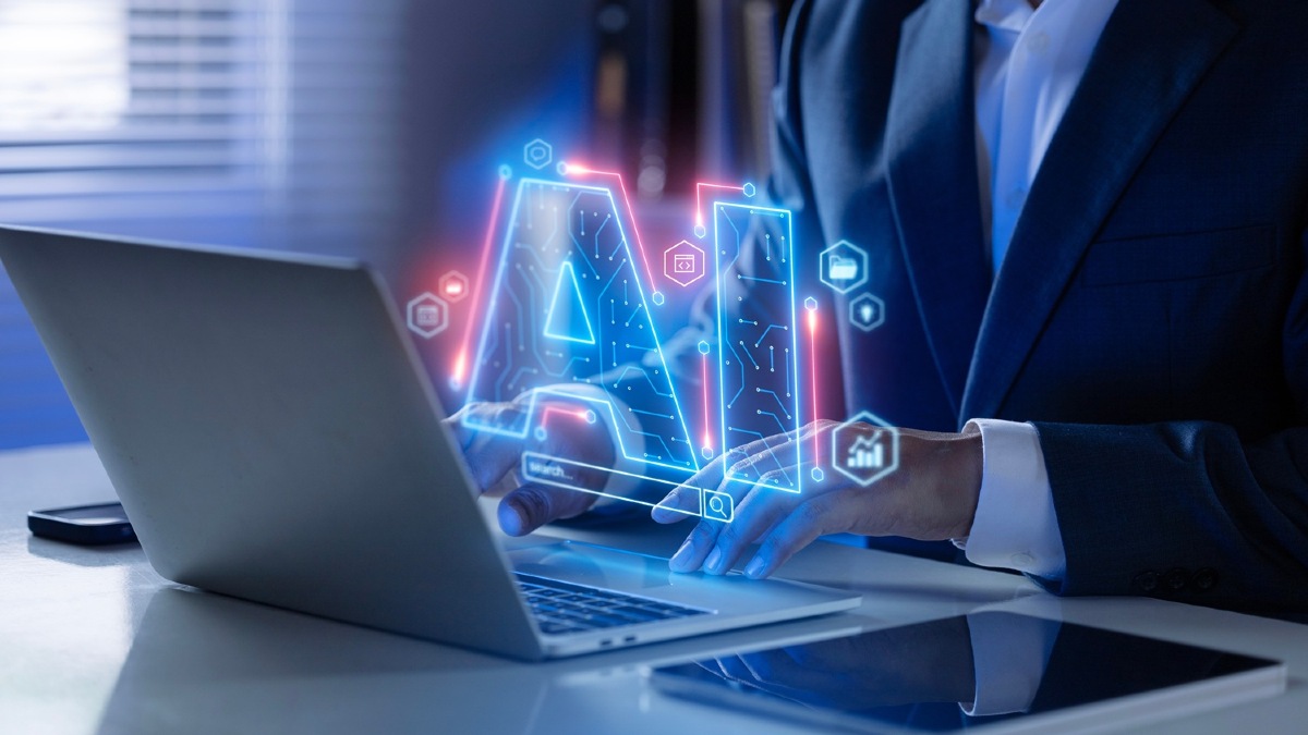 a person using AI on laptop