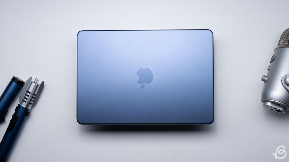 MacBook Neo closed lid shown on a white table