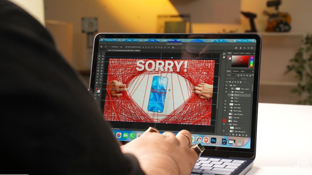 MacBook Neo using Photoshop to edit images