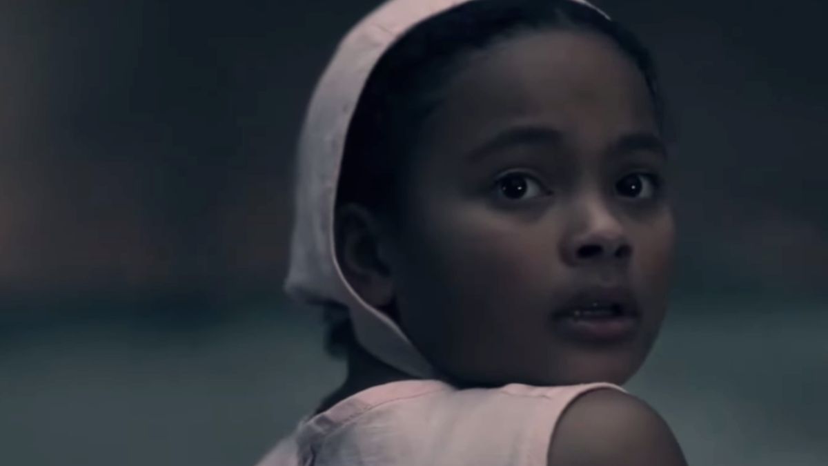 Jordana Blake as Hannah in The Handmaid's Tale