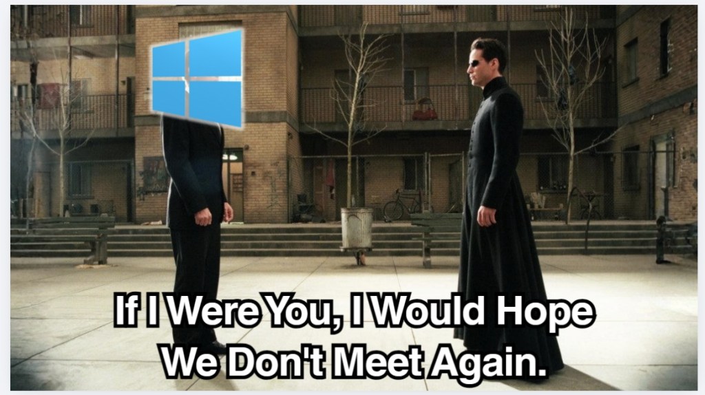 scene from the Matrix with Neo staring at the Windows logo
