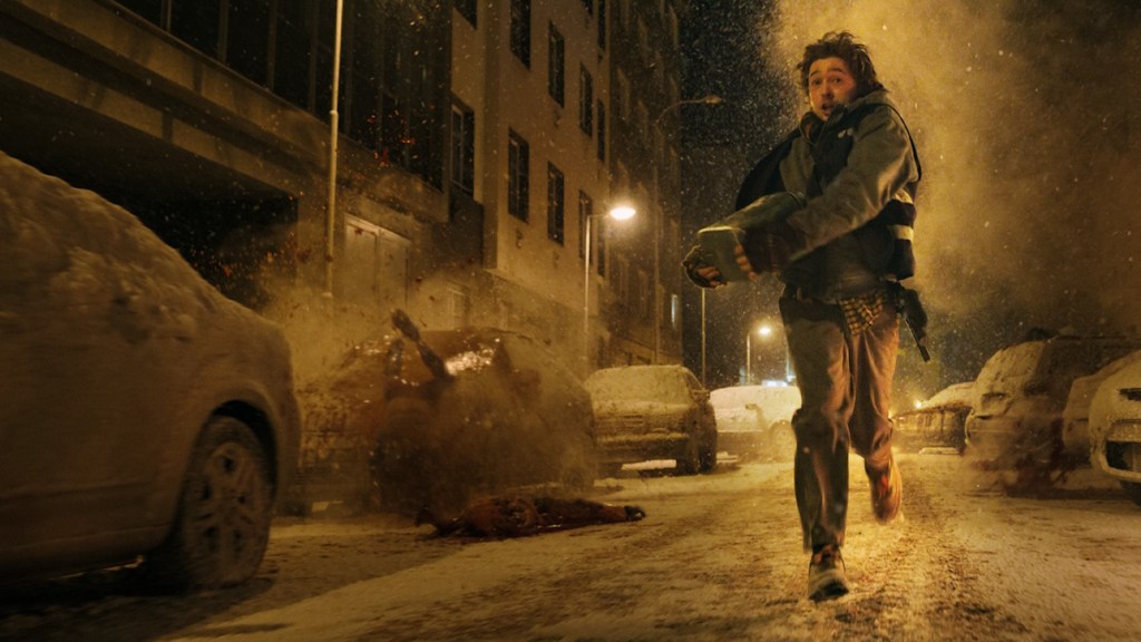 Bryan running away from the zombies in the new Resident Evil movie