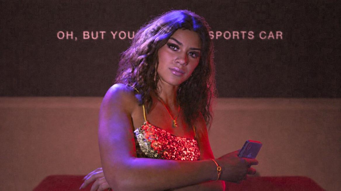 Lucia from GTA 6 in front of Sports Car lyrics
