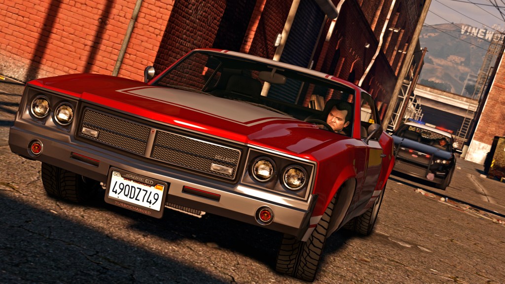 Michael de Santa in a police chase in GTA 5 enhanced, currently 50% off on both Steam and Epic Games.