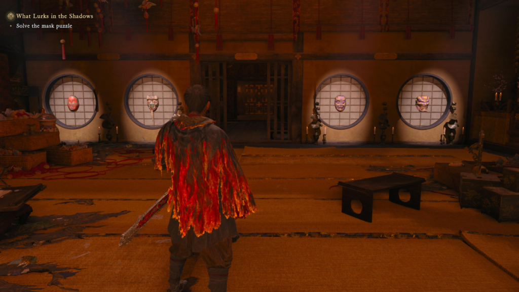 Musashi looking at the Mask puzzle by the entrance in Onimusha: Way of the Sword.